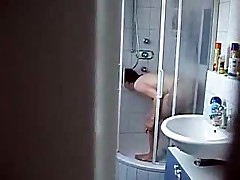 Young Women Cleans The Shower
