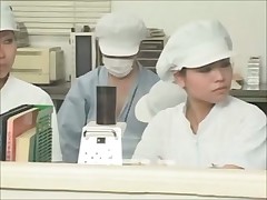 Female working at the condom factory