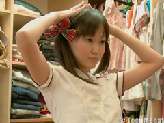 Asian teen dresses as schoolgirl