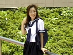 Asian cutie is demonstrating her long legs
