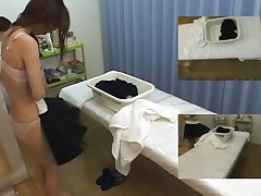 Japanese babe enjoys a hot oily massage with fingering