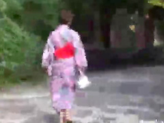 Japanese girls in kimonos outdoors
